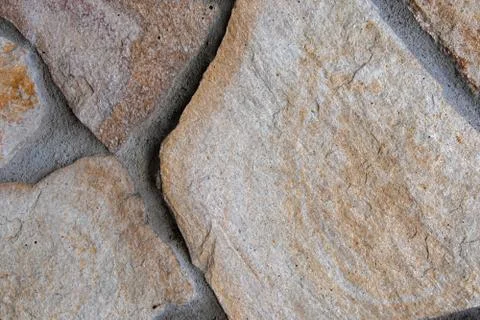 Natural stone texture background with unique pattern. Stock Photos