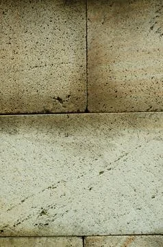 Natural Stone Wall Blocks with Rough Porous Texture Stock Photos