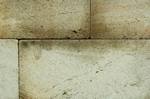Natural Stone Wall Blocks with Rough Porous Texture Stock Photos