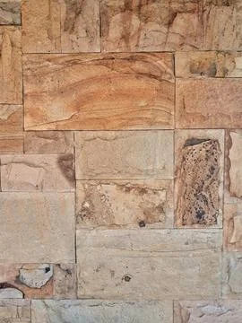 Natural stone wall cladding texture background Stock Photos