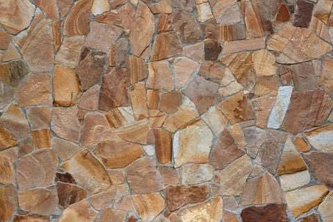 Natural stone wall surface backgrond Stock Photos