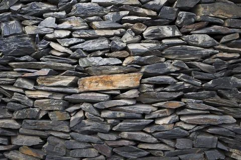 Natural stone wall texture for background Stock Photos