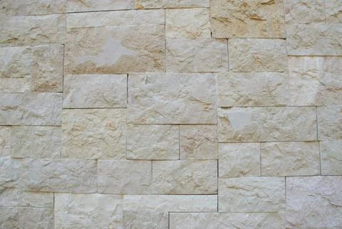 Natural Stone Wall Texture Background with Light Beige Rectangular Wall Pattern Foto stock