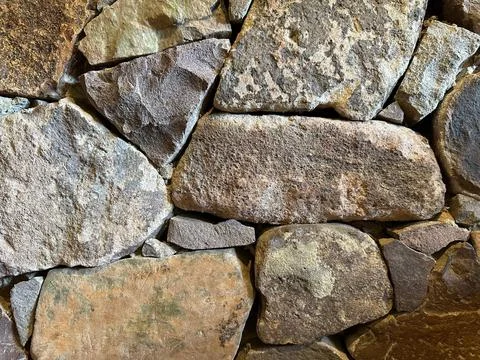 Natural stone wall texture Close-up Stock Photos