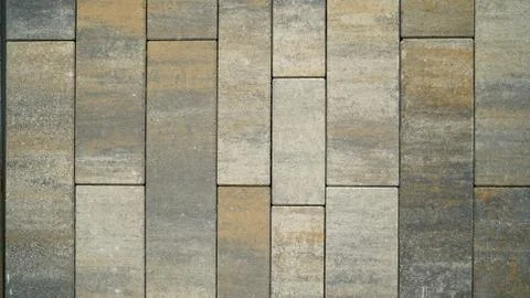 Natural stone wall texture. Rustic colorful surface floor pavement background Stock Photos