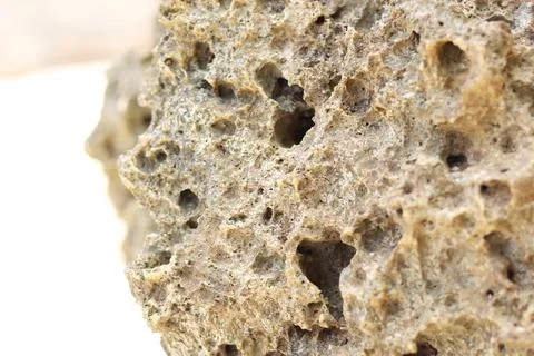 Natural texture of cliffs on the seashore Stock Photos