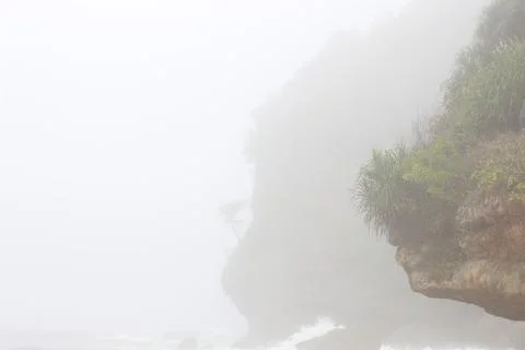 Natural texture of cliffs on the seashore. Stock Photos
