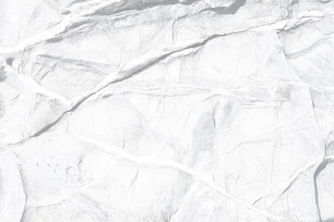 Natural texture of white with a pattern of fractures Stock Photos