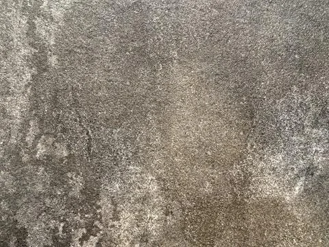 Natural textured background featuring rough gray stone surface with subtle .. Foto stock