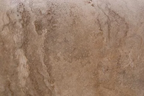 Natural textured stone surface with subtle patterns and earthy tones for modern Stock Photos