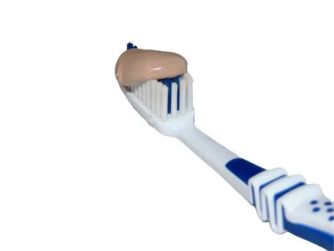Natural toothpaste on a brush Stockfoto's