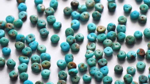 Natural turquoise stone close-up in form of a heap or slide is spinning Stock Footage 121560725