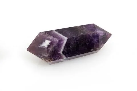 Natural violet two-headed raw mineral crystal amethyst close-up isolated Stock Photos
