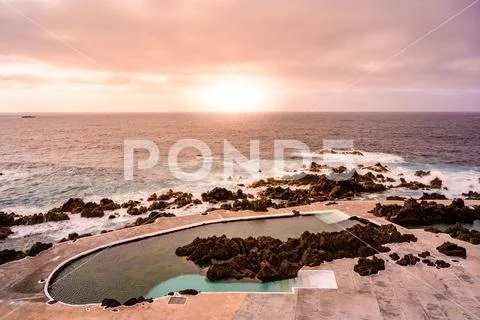 Natural volcanic swimming lagoon pools at Porto Moniz, travel destination for Stock Photos