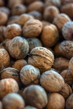 Natural walnut background pattern texture Abstract walnuts heap pattern backg Stock Photos
