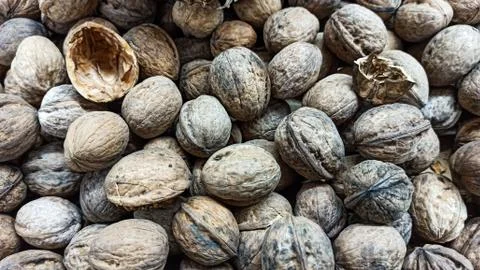 Natural Walnuts with shell background pattern texture Background of fresh walnut Stock Photos