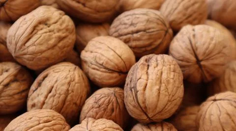 Natural Walnuts with shell background pattern texture.Background of fresh walnut Stock Photos