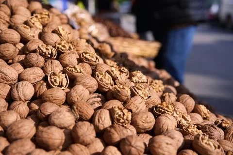 Natural Walnuts with shell background pattern texture. Background of fresh 写真素材