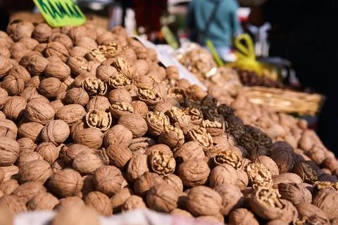 Natural Walnuts with shell background pattern texture. Background of fresh Stock Photos