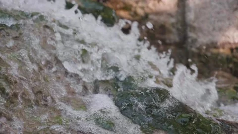 Natural water source, water flow, slowmotion and close natural water source Stock-Footage 136561275
