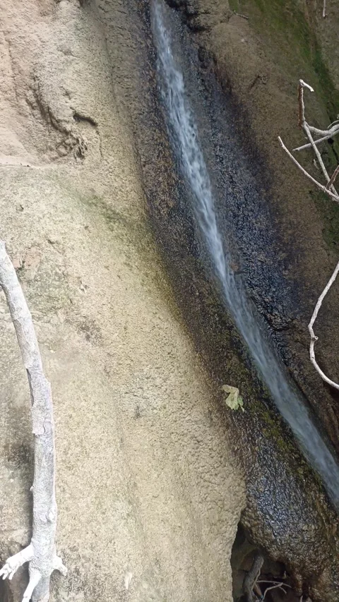 Natural Water Stream Flowing Down Rock Slope Vídeo Stock 340397840