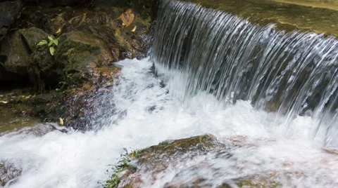 Natural waterfall cascading over rocks in thailand 库存影片 44766113