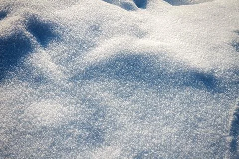 Natural winter backdrop featuring white snow texture Stock Photos