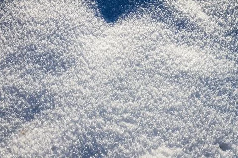 Natural winter backdrop featuring white snow texture Stock Photos