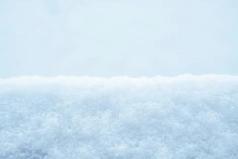 Natural winter background from snow falling on the ground Stock Photos