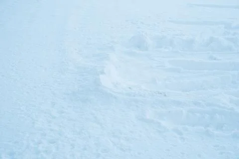 Natural winter background from snow falling on the ground Stock Photos