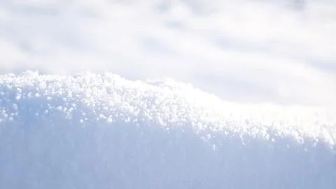 Natural winter background from snow falling on the ground Stock Photos