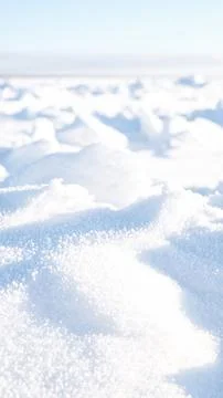 Natural winter background from snow falling on the ground Stock Photos