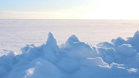 Natural winter background from snow falling on the ground Stock Photos