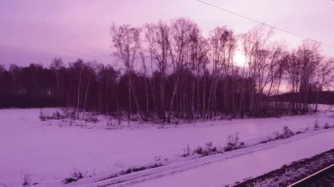 Natural winter landscape from the window of a moving train in Siberia 스톡 동영상 82885538