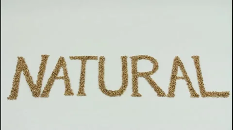 Natural written with wheat kernels Stock Footage 12625078