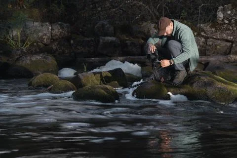 Naturalist photographer on the river Stock Photos
