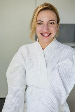 Naturally beautiful face devoid of makeup, beams joyfully towards the camera. Stock Photos