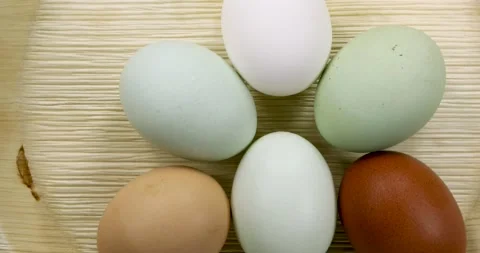 Naturally colored eggs rotating  Stock Footage 147214088