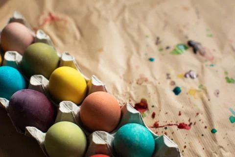 Naturally dyed Easter eggs in egg carton Stock Photos