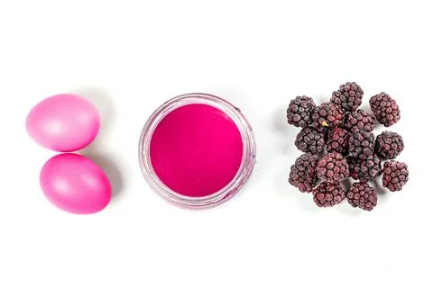 Naturally dyed easter eggs with ripe berries blackberry Stock Photos