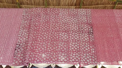 Naturally dyed ethnic patterned fabric background. Stock Footage 341337111
