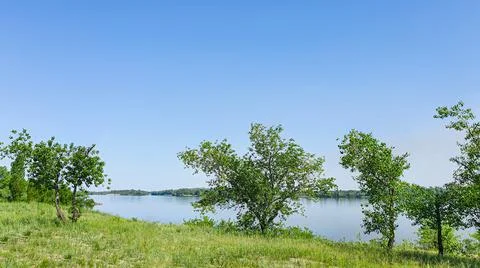 Nature and empty beach on the river. Preparing for the summer season. Reflect Stock Photos