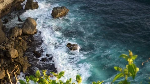 Nature background. Amazing waves of the ocean breaking on the Uluwatu cliff Stock Footage 123164471