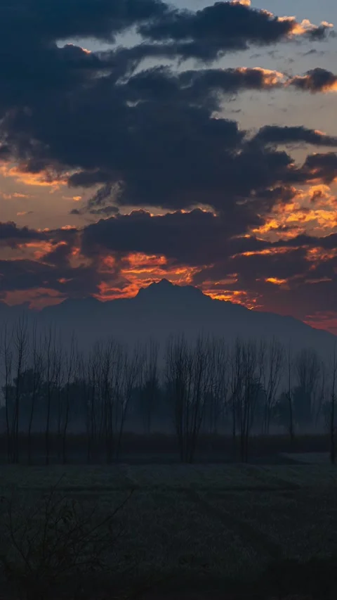 Nature Background of Ethereal Cloud Movement and Silhouette Landscape at Dusk 스톡 동영상 332600354
