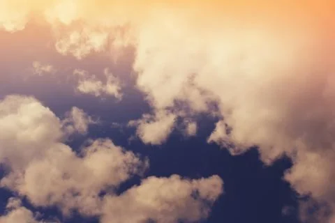 Nature background. Fluffy soft clouds in sky toned. Stock Illustration