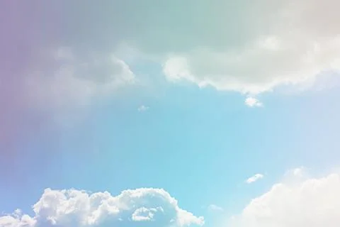 Nature background. Fluffy soft clouds in sky toned. Stockillustratie