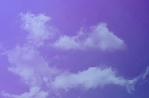 Nature background. Fluffy soft clouds in sky toned. Stockillustratie