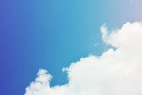 Nature background. Fluffy soft clouds in sky toned. Stock Illustration