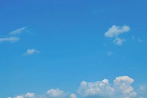 Nature background. Fluffy soft clouds in sky toned. Stockillustratie