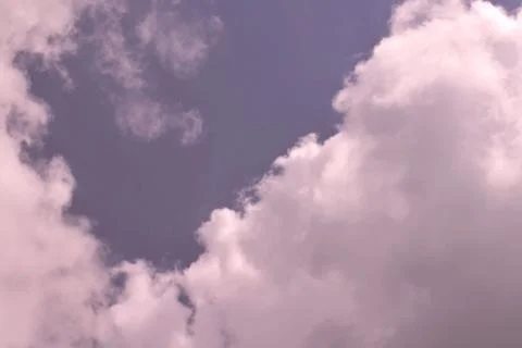 Nature background. Fluffy soft clouds in sky toned. Stockillustratie